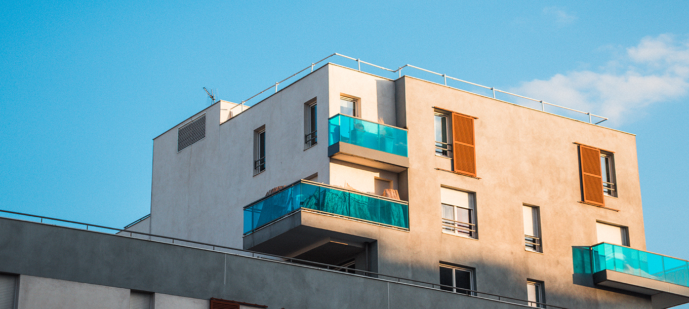 beige-green-building-during-day